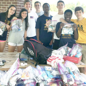 Soccer Teams Pack 200+ Hygiene Bags for Macon Outreach